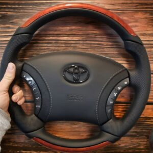 Анатомический руль без подогрева и центральной части на Land Cruiser 100,120 со вставками «Темно рыжее дерево»